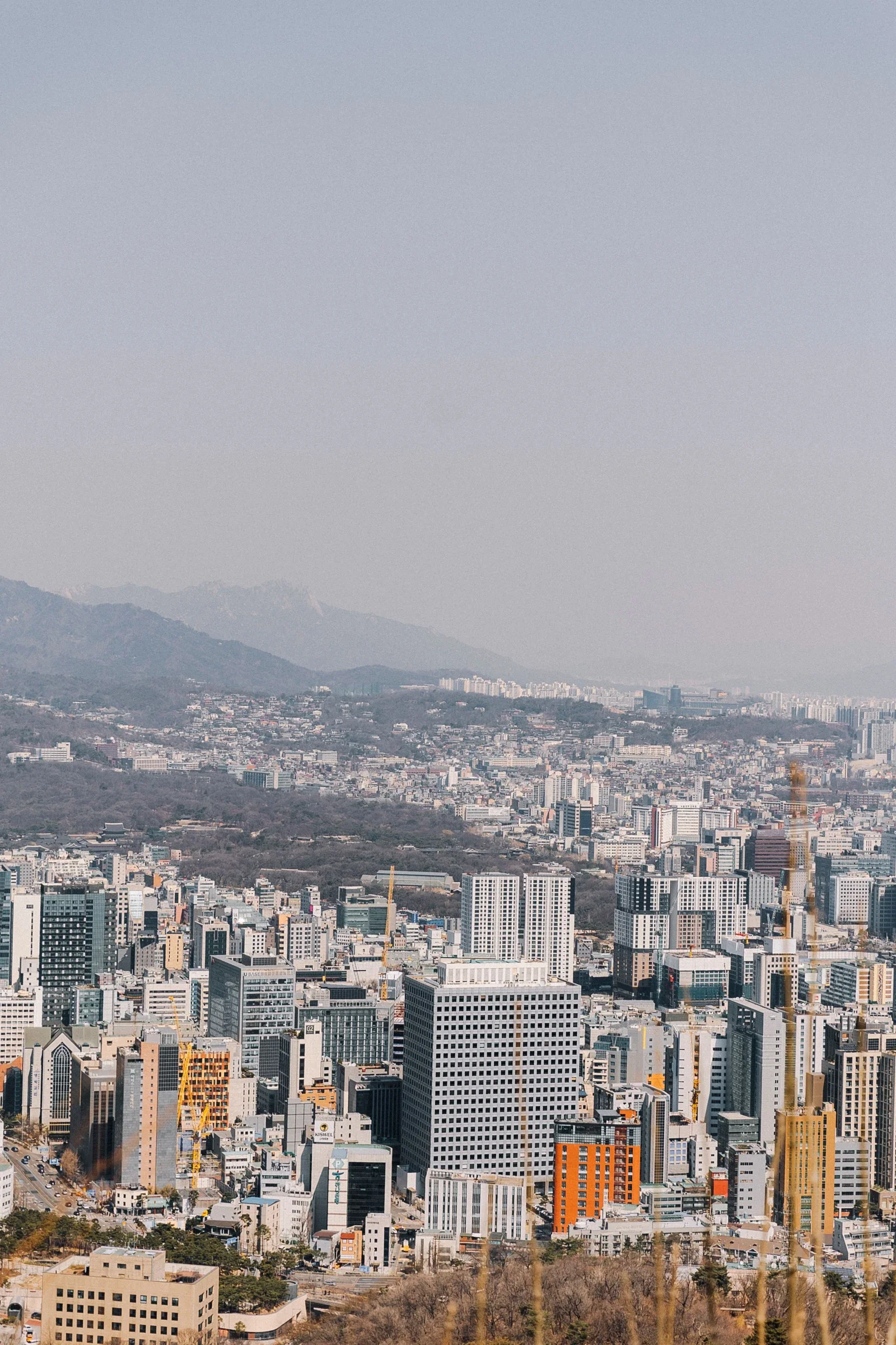 An elevated view of the Seoul skyline and business district in South Korea.