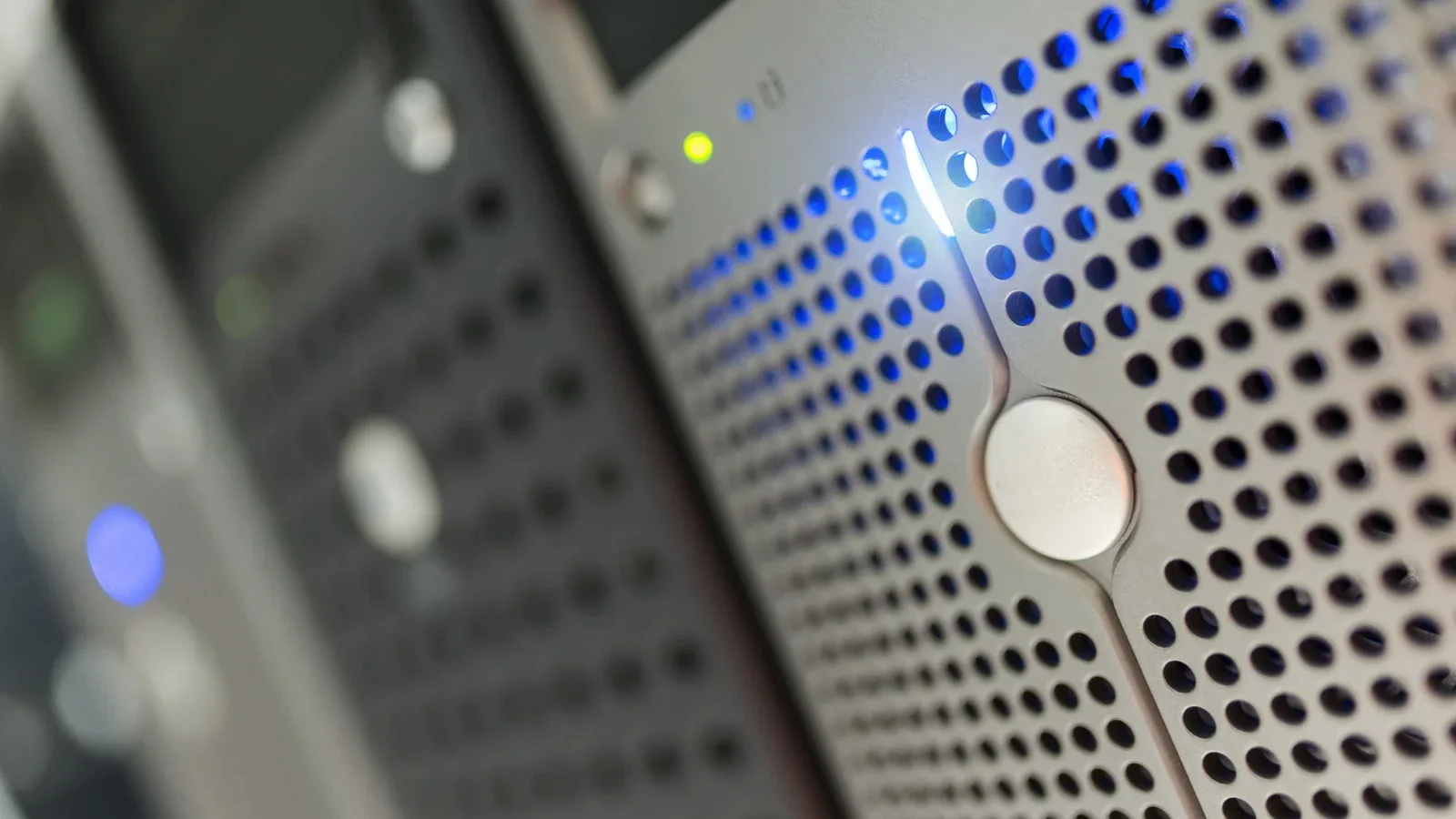 Close-up of illuminated server hardware representing automated computing infrastructure.