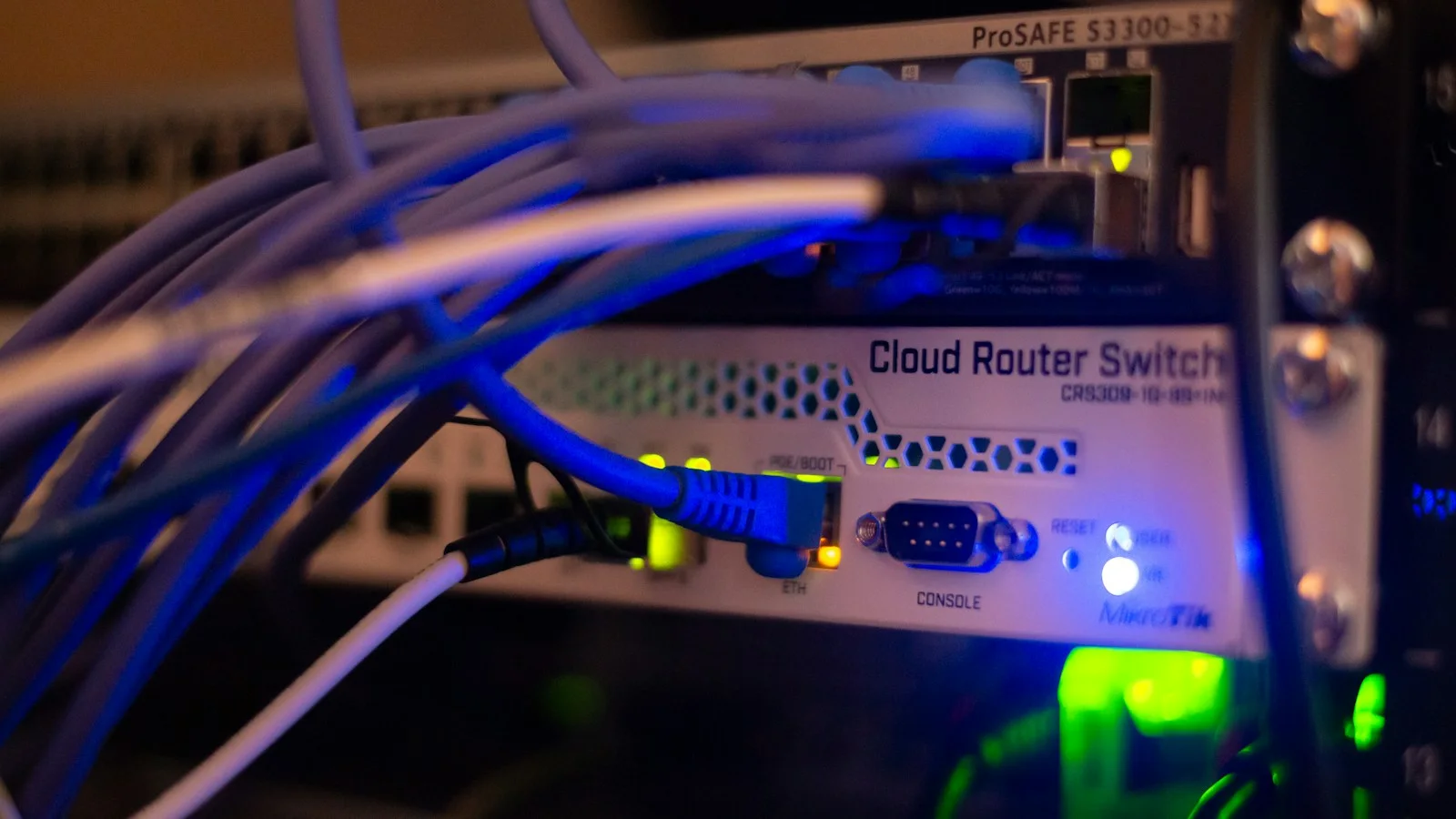 Ethernet cables connected to network equipment; illustrative infrastructure