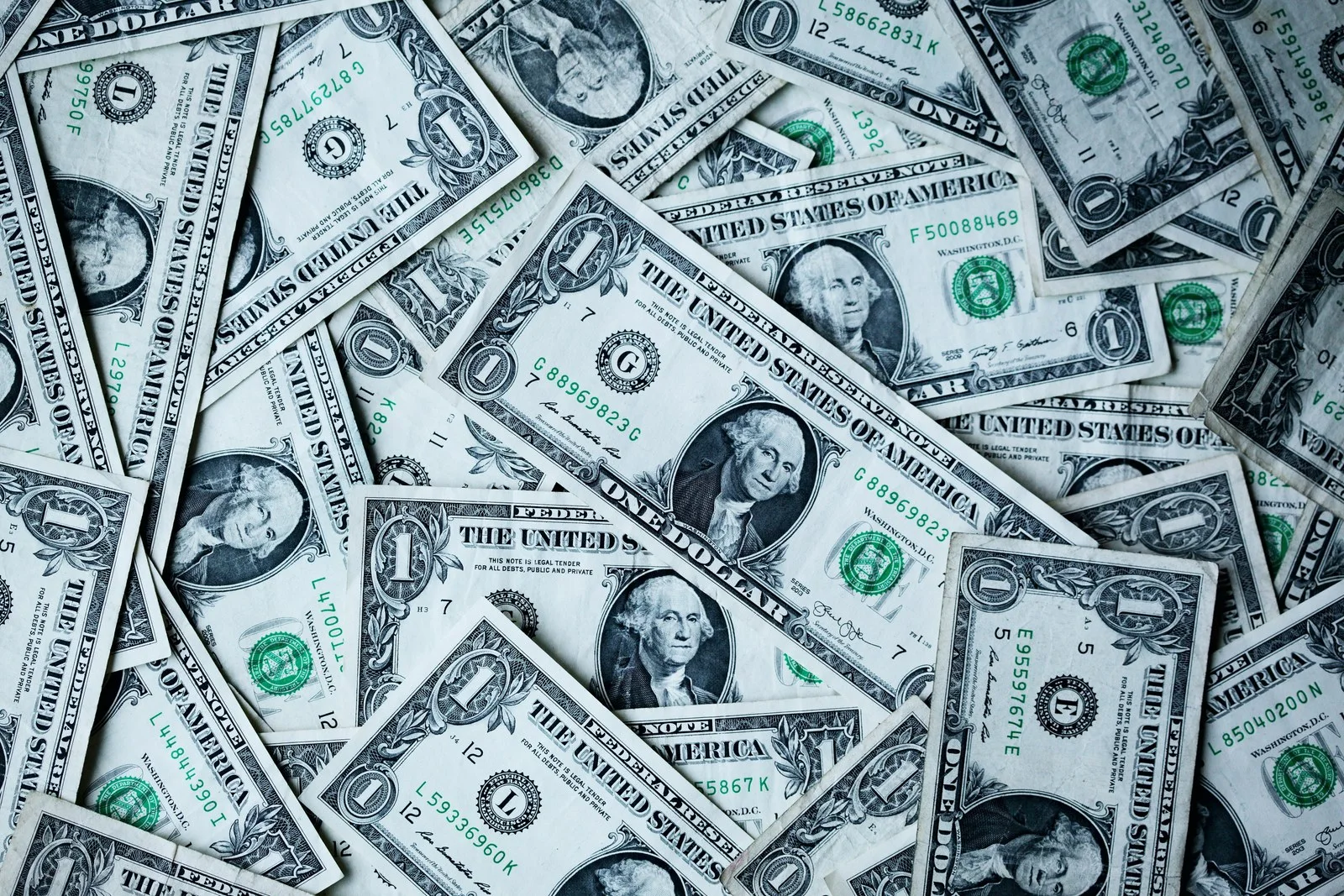 Close-up of US dollar banknotes; illustrative of stablecoins' dollar reference, not evidence of an issuer's reserves.